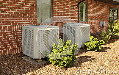 Two central air conditioning units Stock Photo