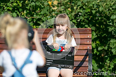 Little girls record a video blog on the camera Stock Photo