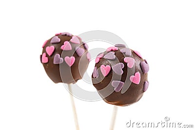 Two chocolate cakepops with hearts decoration Stock Photo