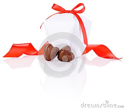 Two chocolate candies in heart shape, white box Stock Photo