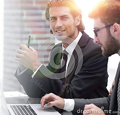 Two clerks working at the Desk Stock Photo