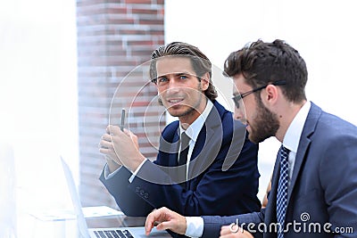 Two clerks working at the Desk Stock Photo