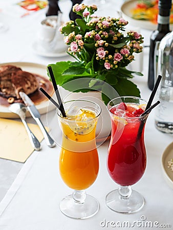 Two cold lemonades berry and passion fruit . Drink with ice Stock Photo