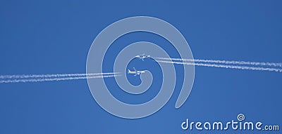 Two Commercial Airliners Pass Each Other at High Altitude Stock Photo