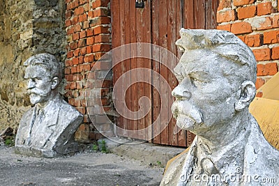 Two concrete bust in Sataniv, Ukraine. Stock Photo