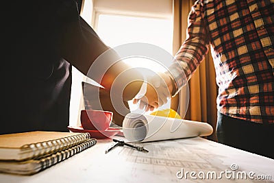 Two confident business man shaking hands during Stock Photo