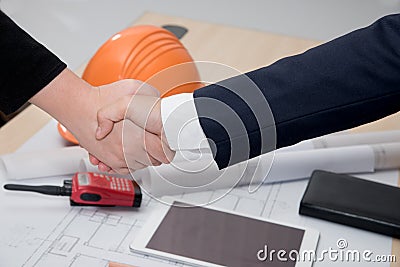 Two confident Businessman and businesswoman shaking hands Stock Photo