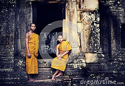 Two Contemplating Monk in Cambodia. Stock Photo