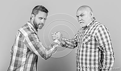 two contradiction of two generation in studio. contradiction of two generation on background. Stock Photo