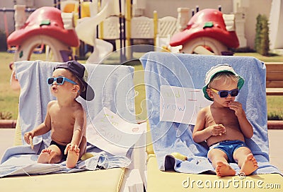 Two cool boys sunbathing Stock Photo