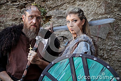 Two Cosplayers dressed as Ragnar and Lagertha, characters from the TV series Vikings at the Lucca Comics and Games 2022 Editorial Stock Photo