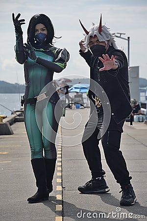 Two Cosplayers at Raffles Marina jetty area during Cosfest Kansha 2022 Editorial Stock Photo