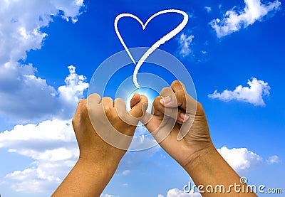 Two coupled hands on sky. Stock Photo