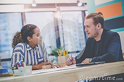 Two Creative Marketeer is brainstorming on business data Stock Photo