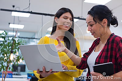 Two Creative office workers collaborate together to discuss main ideas for creating businness investment plan, analyze Stock Photo