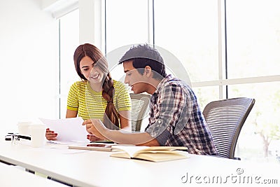 Two Creatives Working Together In Design Studio Stock Photo