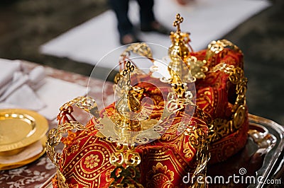 Two wedding crowns in church close up Stock Photo