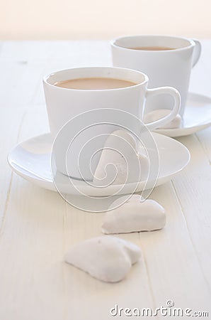 Two cups coffee with heart-shape cookies Stock Photo