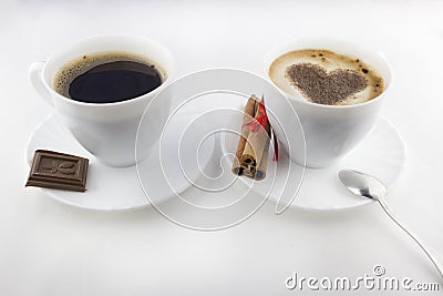 Two cups of coffee on a white background, cinnamon, chocolate drink Stock Photo