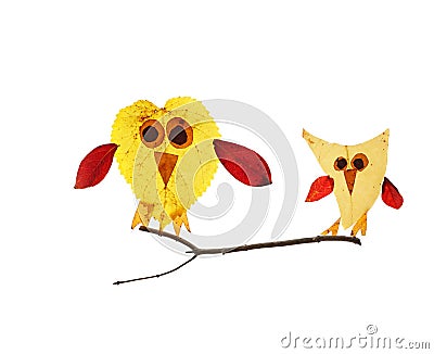 Two cute birds made of assorted Autumn leaves , isolated on white Stock Photo