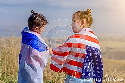 Two cute children with American and Israel flags. Stock Photo