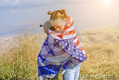 Two cute girls with American and Israeli flags. Stock Photo