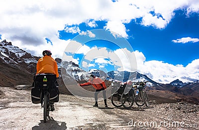 Two cyclist on mountains road. Himalayas, Jammu Stock Photo