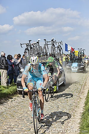 Two Cyclists on Paris Roubaix 2014 Editorial Stock Photo