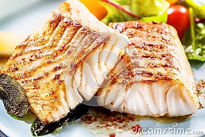 Two delicious fillets of marinated pollock Stock Photo