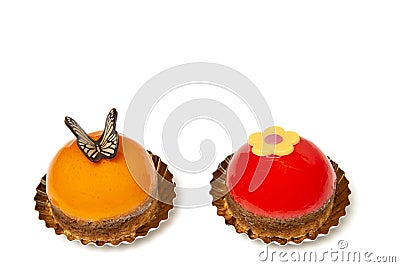 Two delicious looking small round cakes on a white background with space for copy Stock Photo