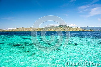 Two Different Color of Clear Turquoise and Blue Sea at Taka Makassar Island Stock Photo