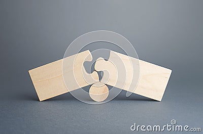 Two disassembled puzzles. Stop of work process and destruction of integrity due to obstacles or circumstances. Failure, inability Stock Photo