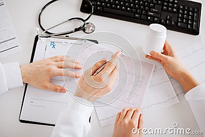 Two doctors prescribing medication Stock Photo