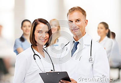 Two doctors with stethoscopes Stock Photo