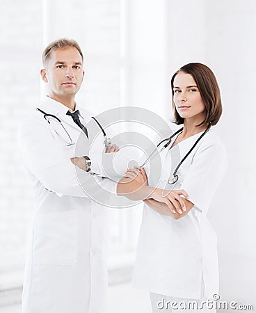 Two doctors with stethoscopes Stock Photo