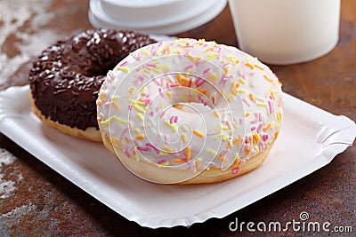 Two donuts on a paper tray Stock Photo