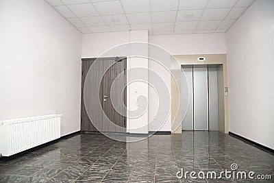 Two doors of elevators in modern business building. Stock Photo