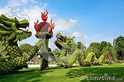 Two dragons frolicking with a pearl Stock Photo