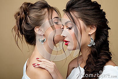 Two elegance ladies hugging Stock Photo