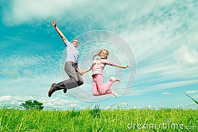 Two enamoured jump Stock Photo