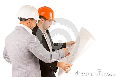 Two engineers or architects discussing a plan Stock Photo