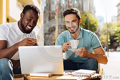 Two enthusiastic guys spending their time together Stock Photo