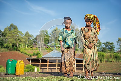 Two ethiopian girls going for water near Addis Ababa, Ethiopia Editorial Stock Photo