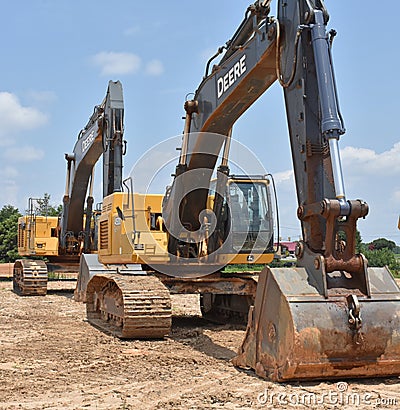 Excavators lined up in a row Editorial Stock Photo