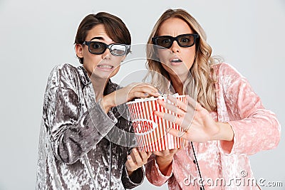 Two excited girls wearing pajamas standing Stock Photo