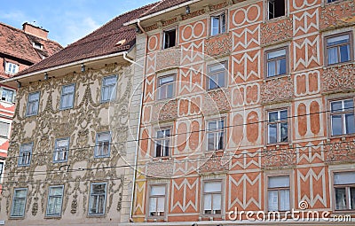 Two facades of historic buildings, located in the large square of Graz, superbly decorated, especially the one on the left. Stock Photo