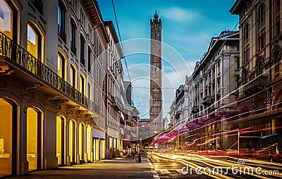 Two famous falling Bologna towers Asinelli. Evening view. Bologna, Emilia-Romagna, Italy. Long exposure, time lapse Stock Photo