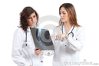 Two female doctors watching a radiography Stock Photo