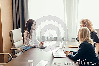 Getting a new job concept. Job interview with woman applicant in office. Stock Photo