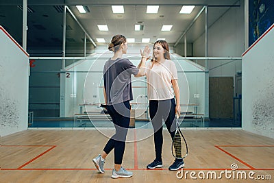Two female squash players before competition Stock Photo